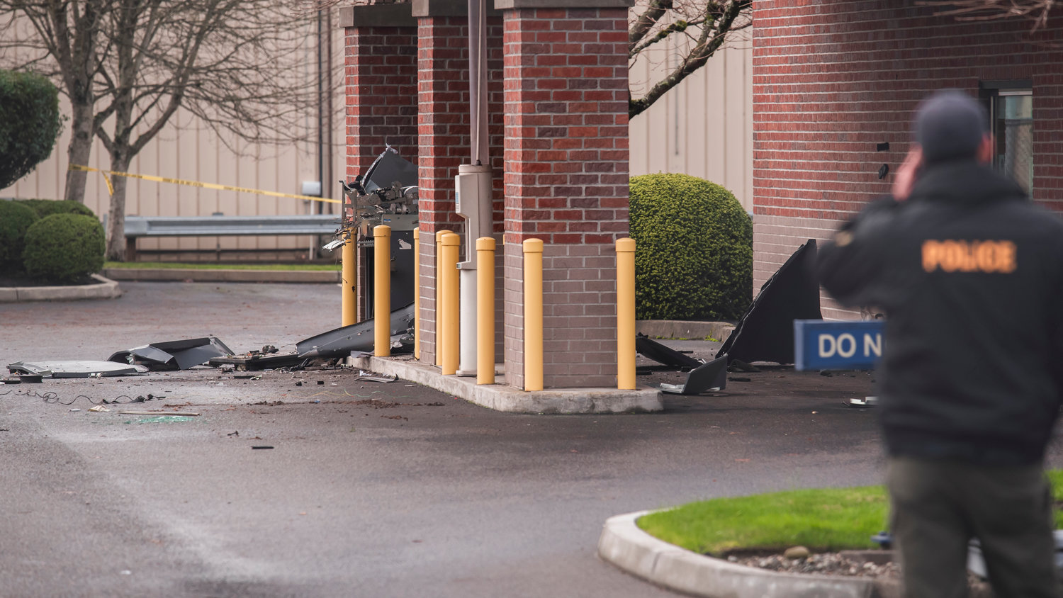 Debris is seen scattered in an area where an ATM once stood outside the 1st Security Bank in Centralia after reports of an explosion in the area last month.