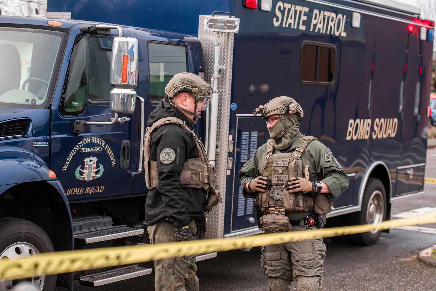 State Patrol Bomb Techs suit up while responding to a scene at the 1st Security Bank location at 604 South Tower Avenue in Centralia after reports of an explosion in the area last month.