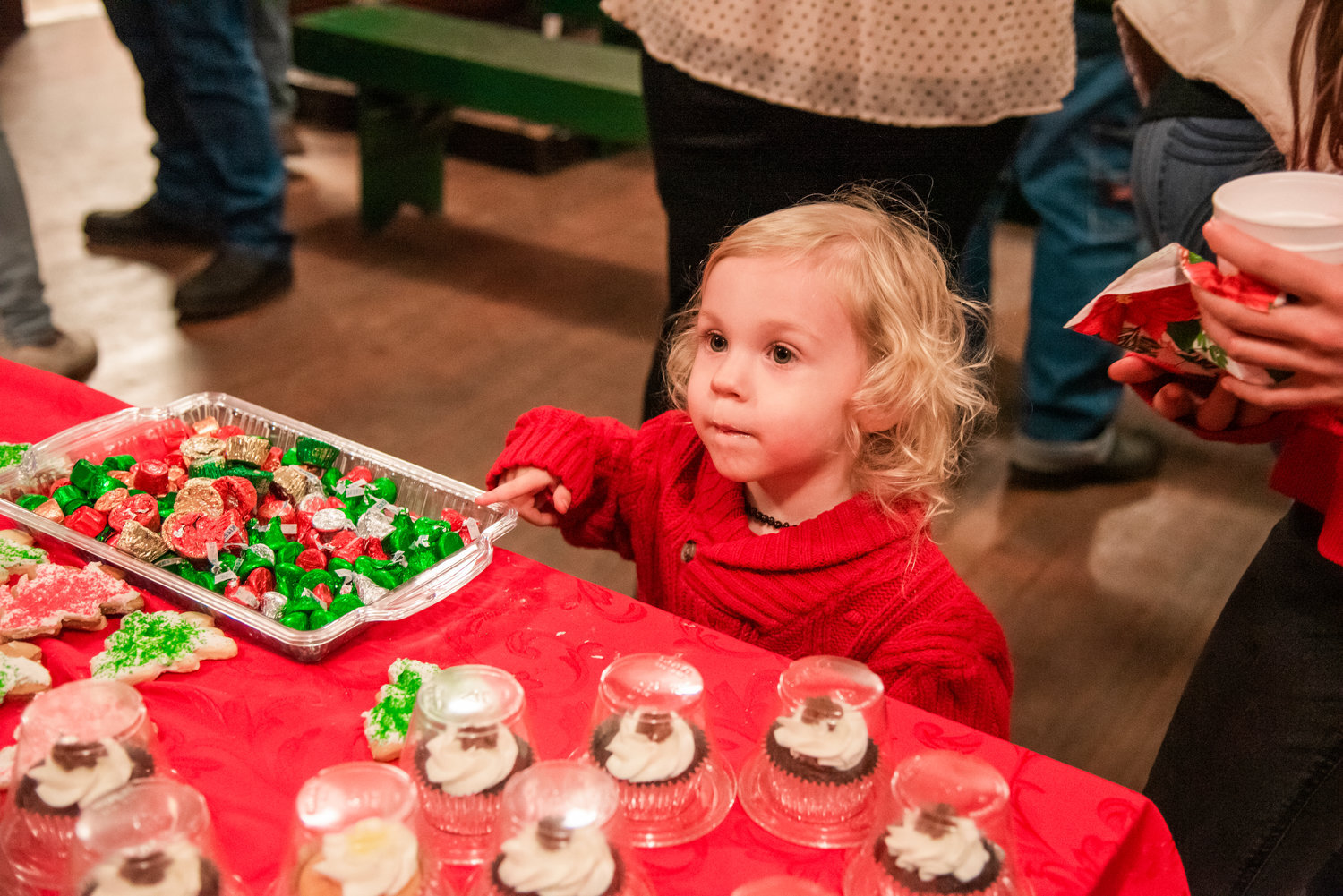 Kyton, 2, asks for candy at the Newaukum Valley Schoolhouse during a Christmas program Sunday night in Chehalis.