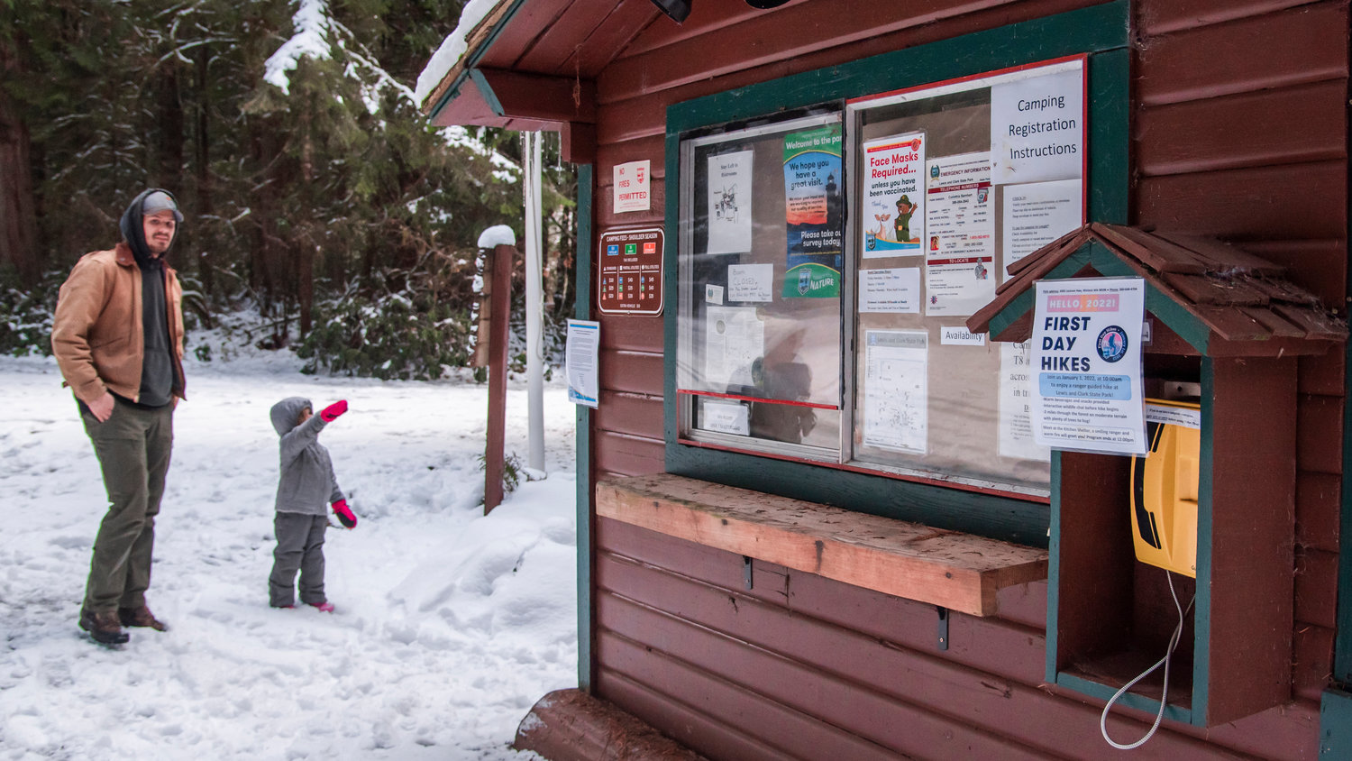 Lucy Wade, 4, points out signs on a building during a visit to Lewis and Clark State Park with her family on Saturday.