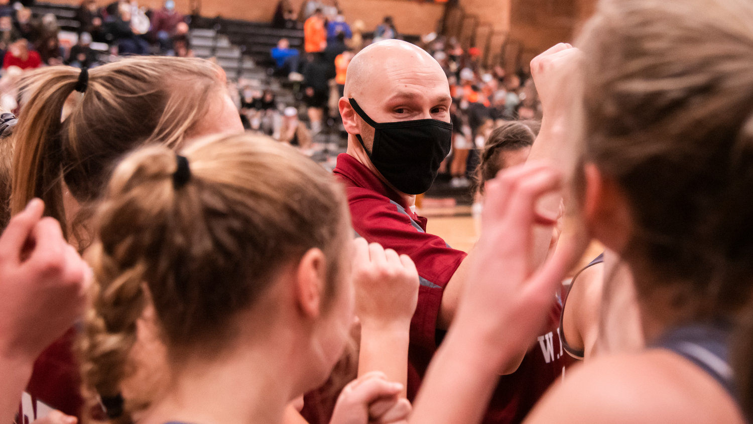 W.F. West Girls Basketball Head Coach Kyle Karnofski breaks with players Tuesday night during a Swamp Cup rivalry game in Centralia.