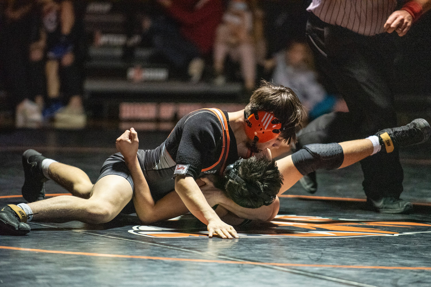 Centralia sophomore Antonio Campos, top, pins a Tumwater wrestler at 120 pounds during a dual match at home on Jan. 5.