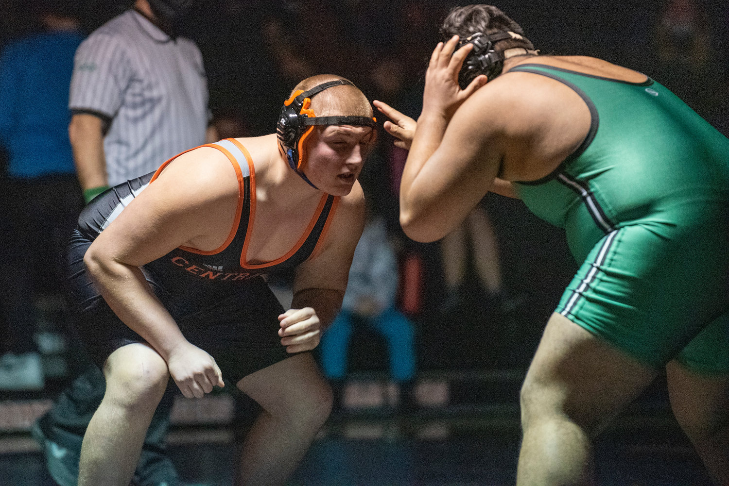 Centralia junior Willy Stinkeoway, left, prepares to tie up with a Tumwater wrestler at 285 pounds on Jan. 5.