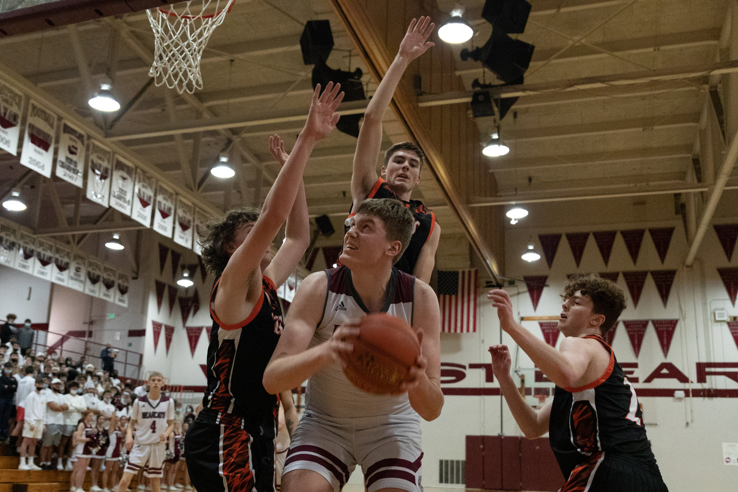 W.F. West's Soren Dalan is swarmed by three Tigers in the post against Centralia Jan. 5.
