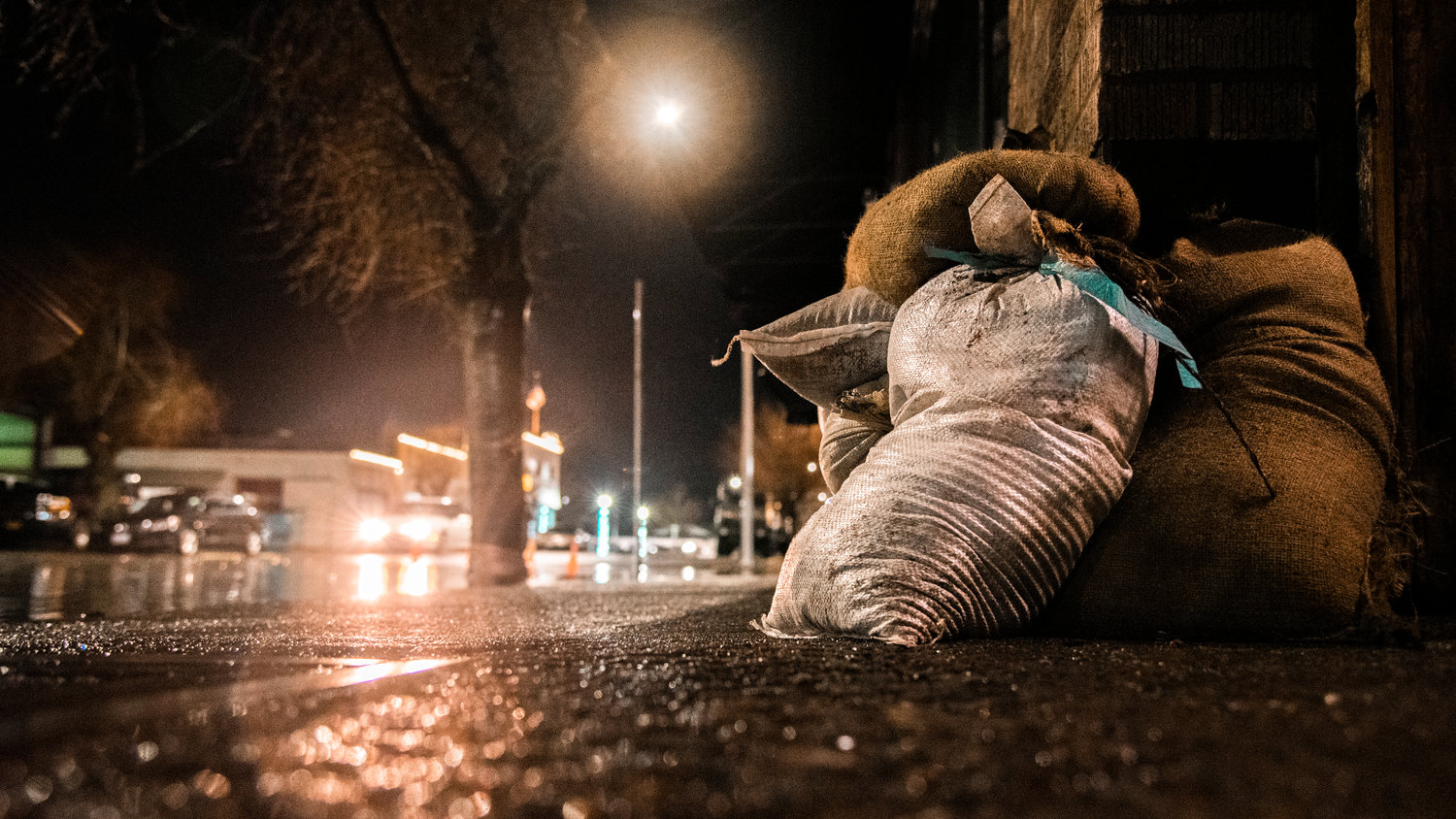 Sandbags sit around businesses in downtown Centralia Thursday night.