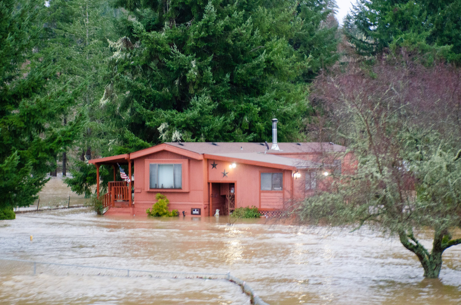 Bucoda residents awoke Friday morning to Skookumchuck River floodwaters inundating their roadways, though emergency operation center operators, fire staff and volunteers were waiting for sunlight to assess the damage.