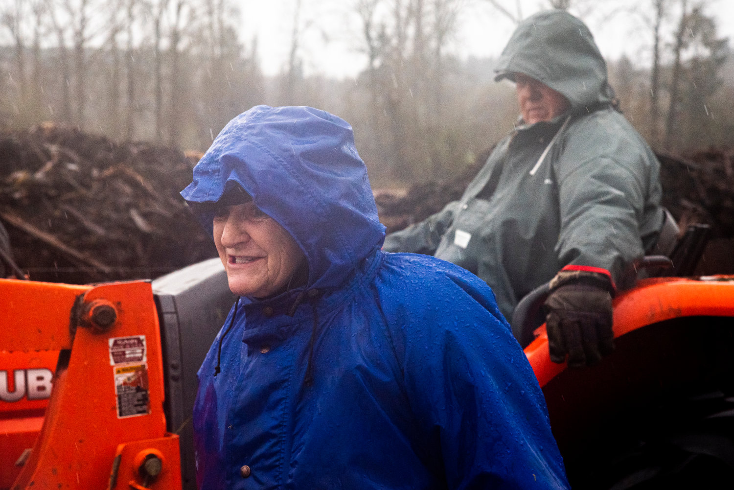 Penny Mall smiles while taking about her critter pad as it rains along Hamilton Road in Chehalis on Thursday.