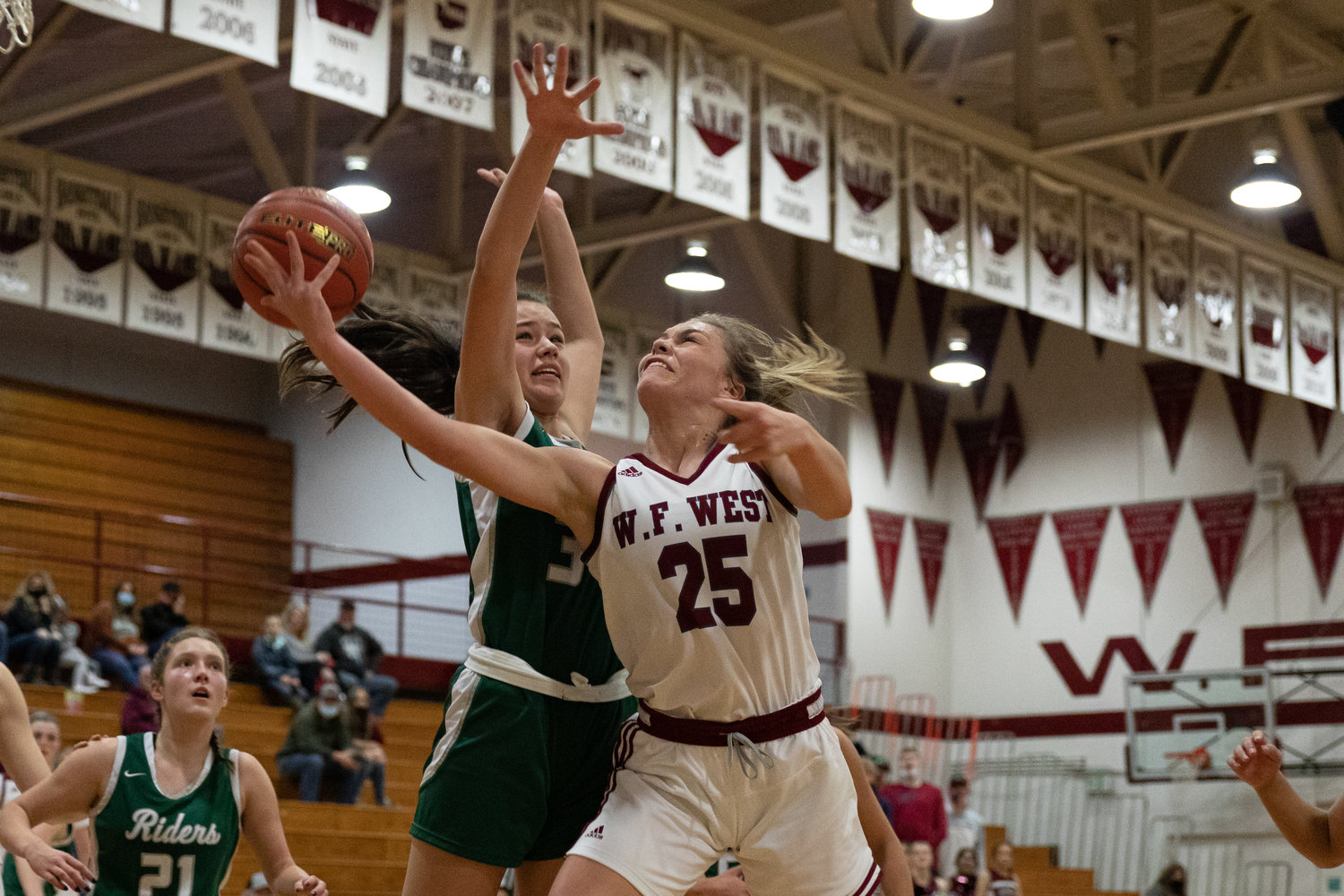 W.F. West guard Kyla McCallum stretches past the defense to put a layup through the net at the end of the first half against Port Angeles Jan. 8.