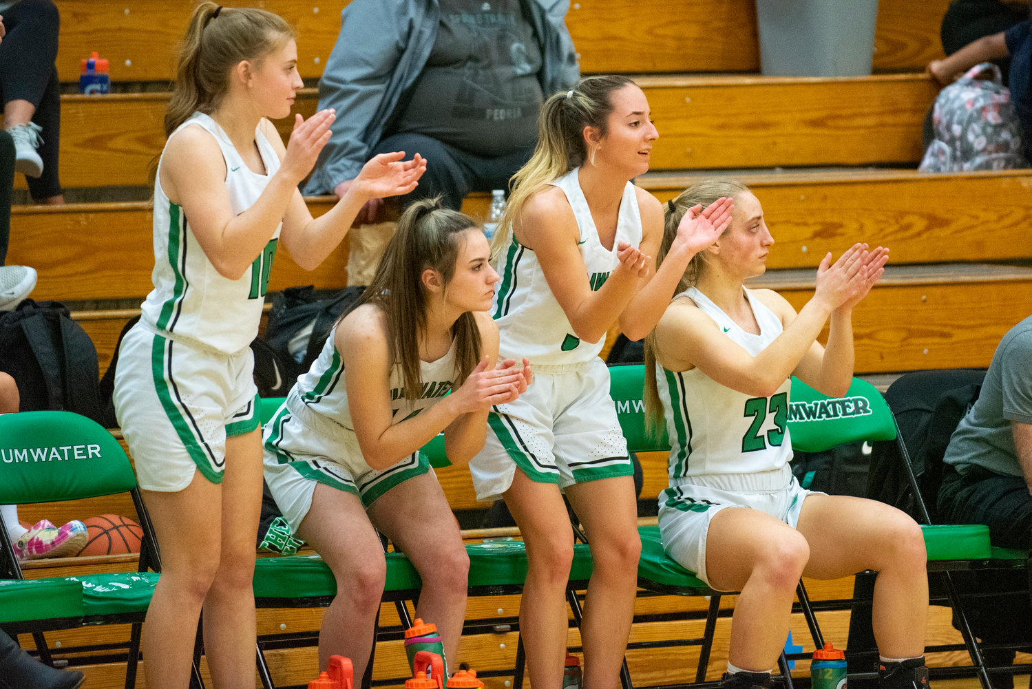 Tumwater's bench celebrates a bucket against Camas at home on Jan. 10.