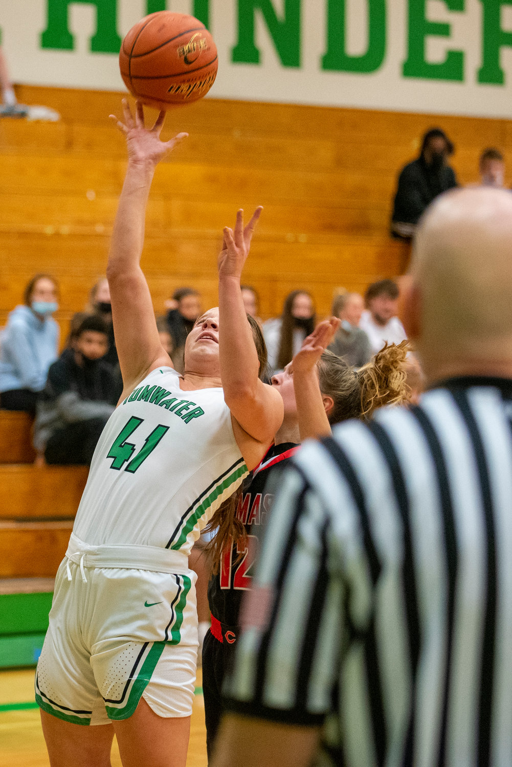 Tumwater's Cassie Kaufman (41) throws up a layin against Camas on Jan. 10.