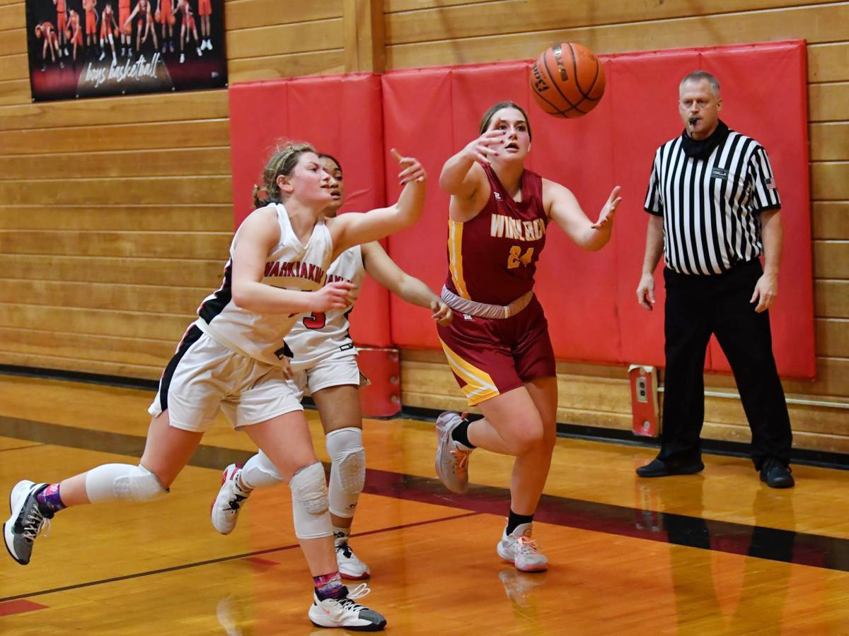Winlock's Addison Hall (24) chases after a loose ball during a road game at Wahkiakum on Monday.