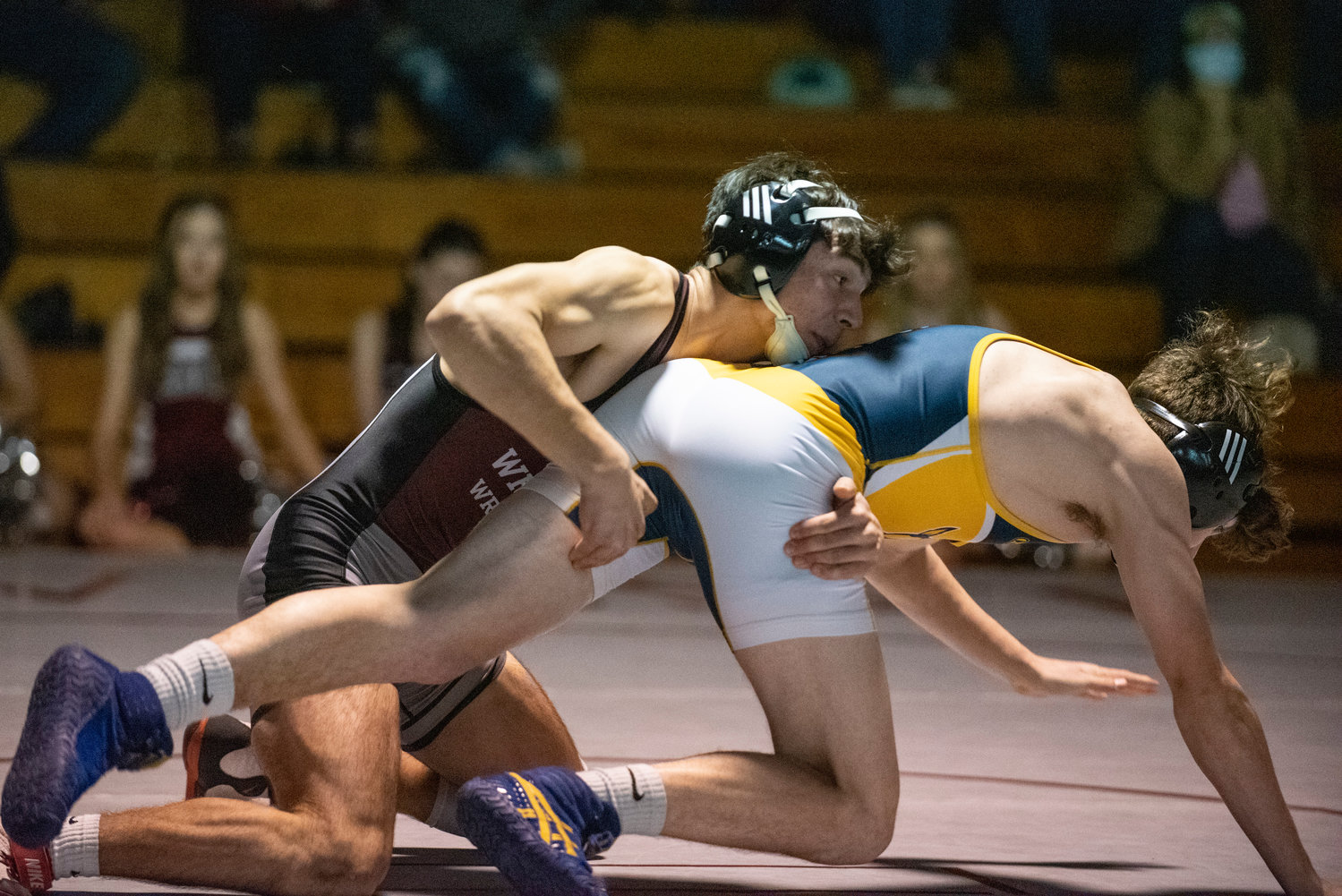 W.F. West's Cristo Parriott, left, grapples with Aberdeen's Shane Glowacki during a home dual match on Jan. 12.