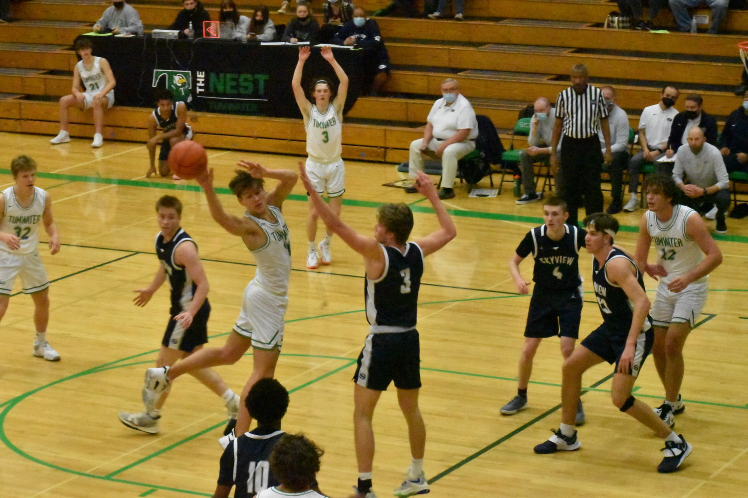 Tumwater's Andrew Collins drives and kicks it out to a shooter Jan. 15 against 4A Skyview. Collins finished with 17 points in the win.
