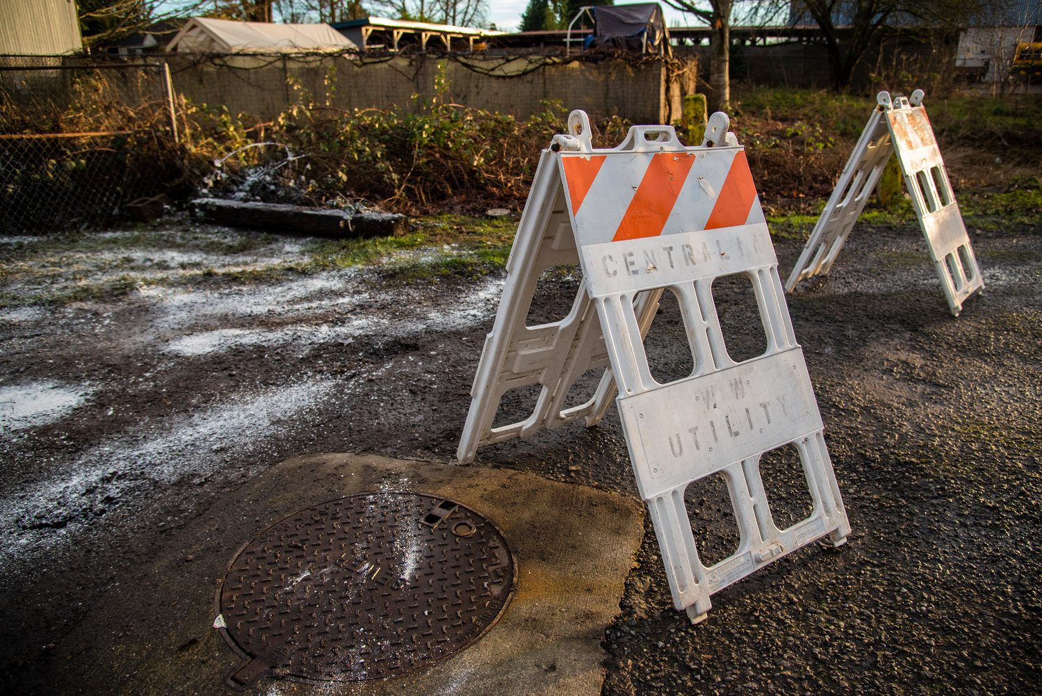 A manhole is seen in the 500 block of Hemlock Street after China Creek flowed over in Centralia.