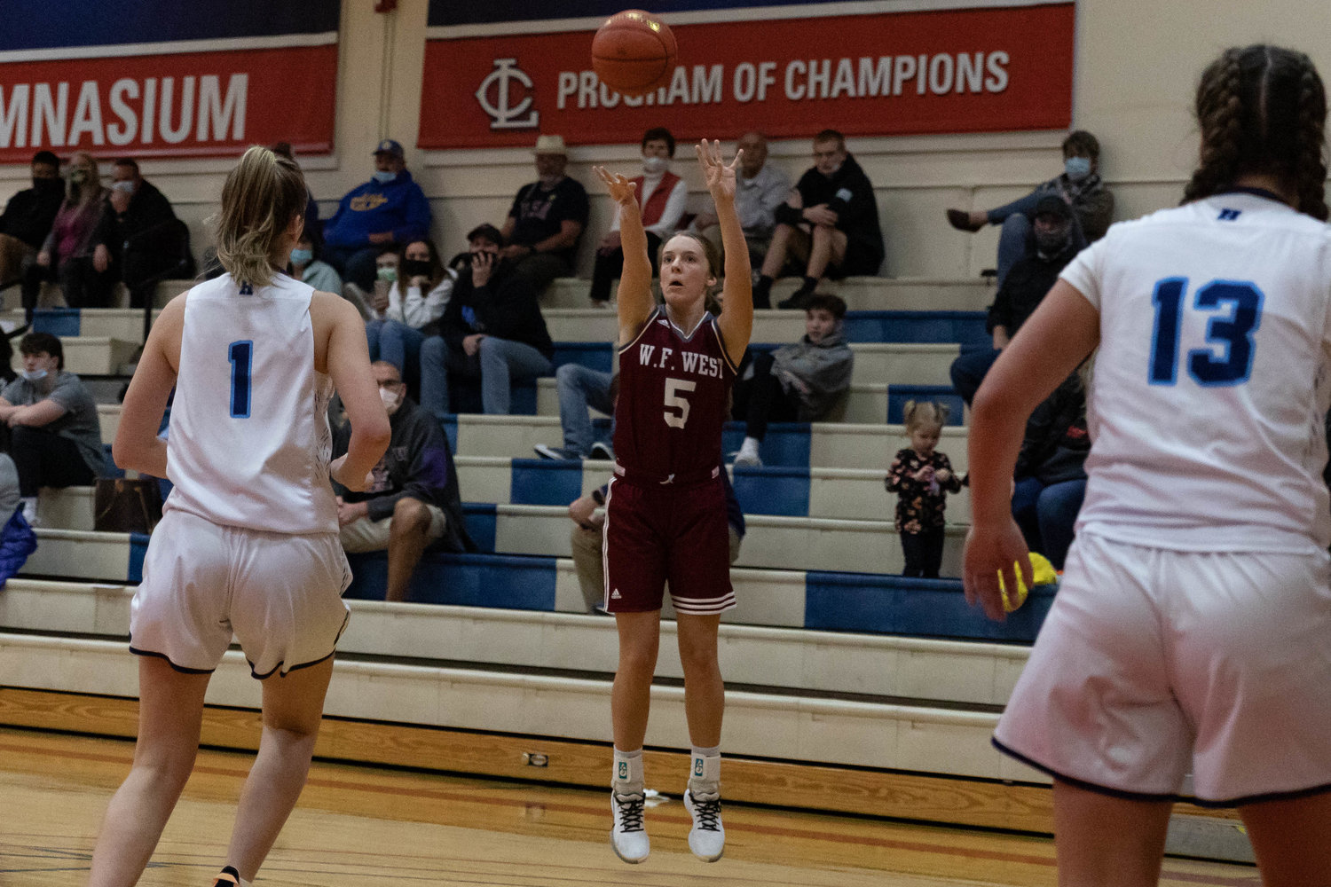 W.F. West guard Makayla Mencke takes a 3-pointer against Hockinson at the MLK Tribute in Longview at Lower Columbia Community College Jan. 17.