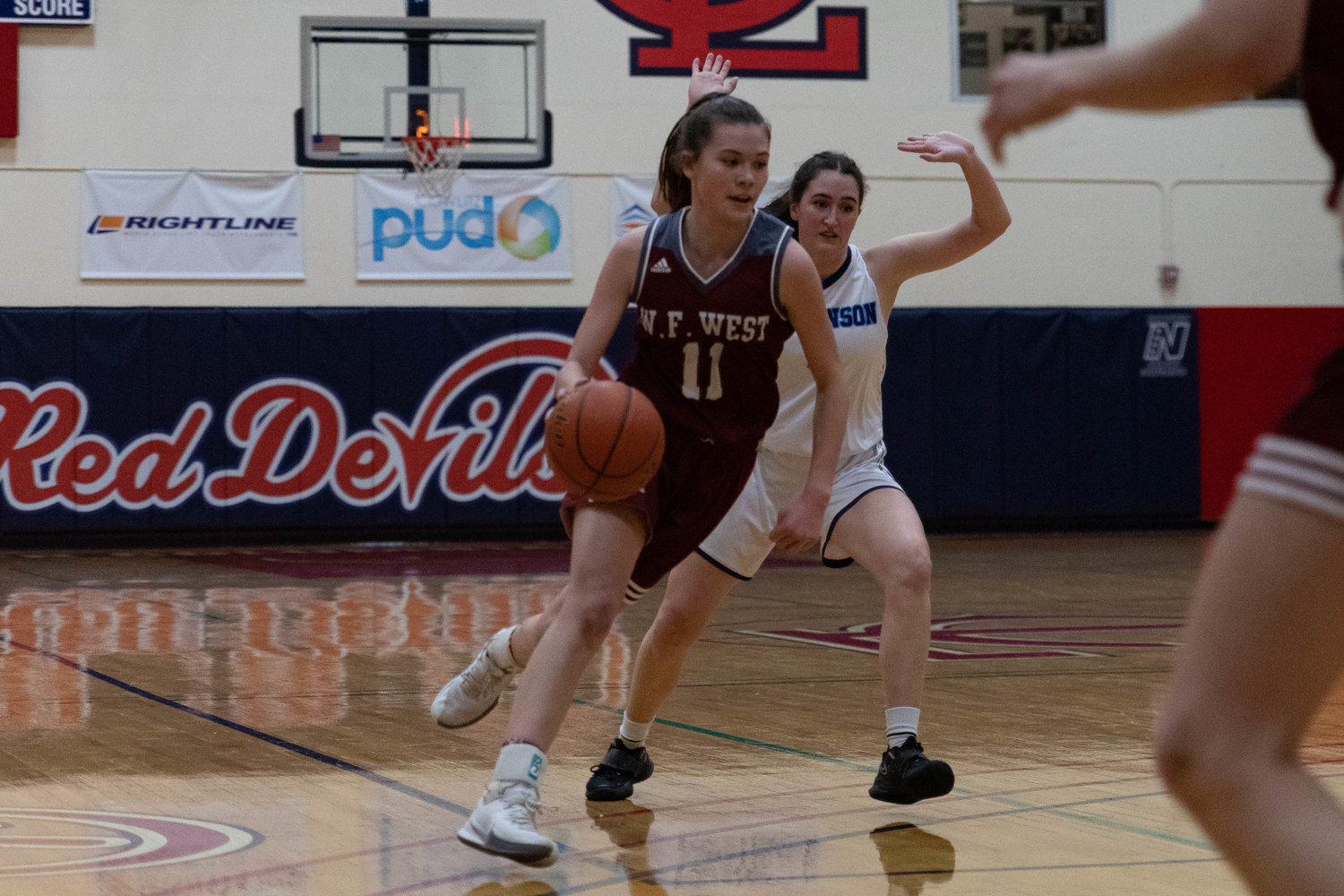 W.F. West forward Olivia Remund drives toward the hoop against Hockinson at the MLK Tribute in Longview at Lower Columbia Community College Jan. 17.