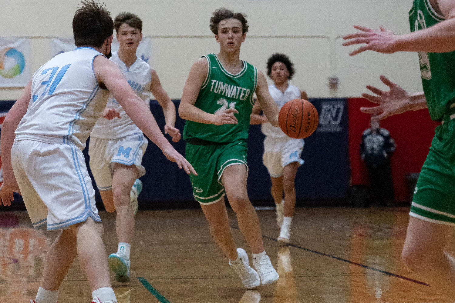 Tumwater guard Connor Hopkins drives down the floor against Mark Morris at the MLK Tribute in Longview at Lower Columbia Community College Jan. 17.