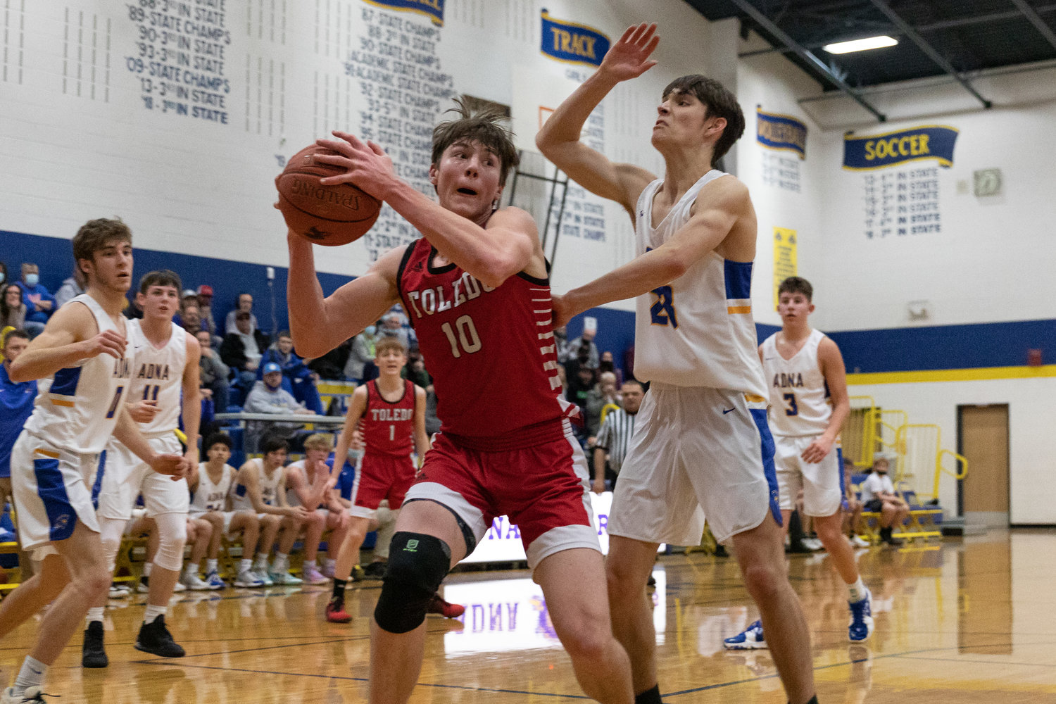 Toledo forward Carson Olmstead looks to score in the low post against Adna Jan. 21.