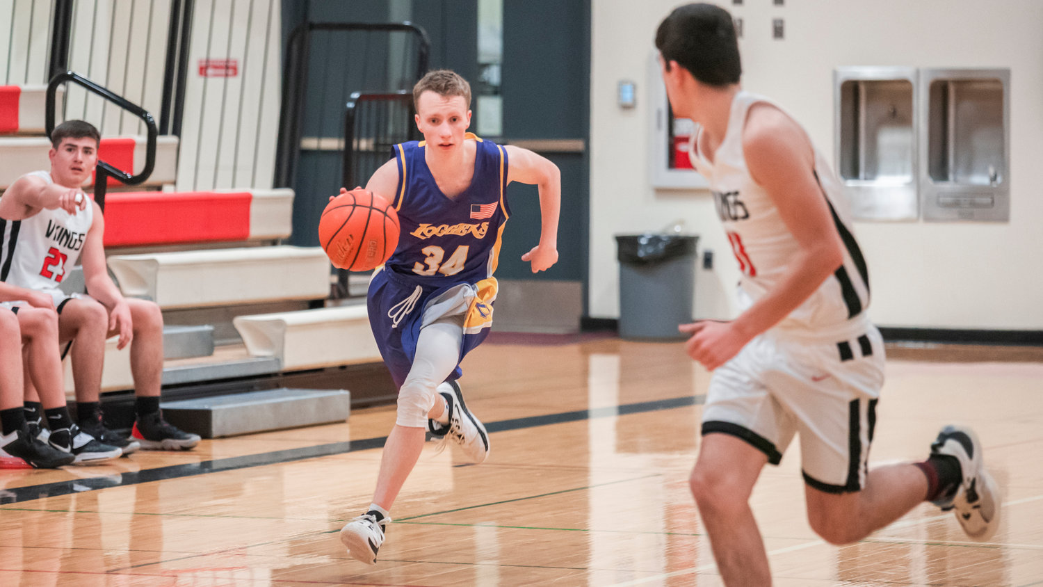 Onalaska’s Ben Russon (34) dribbles the ball down court Monday night in Mossyrock.