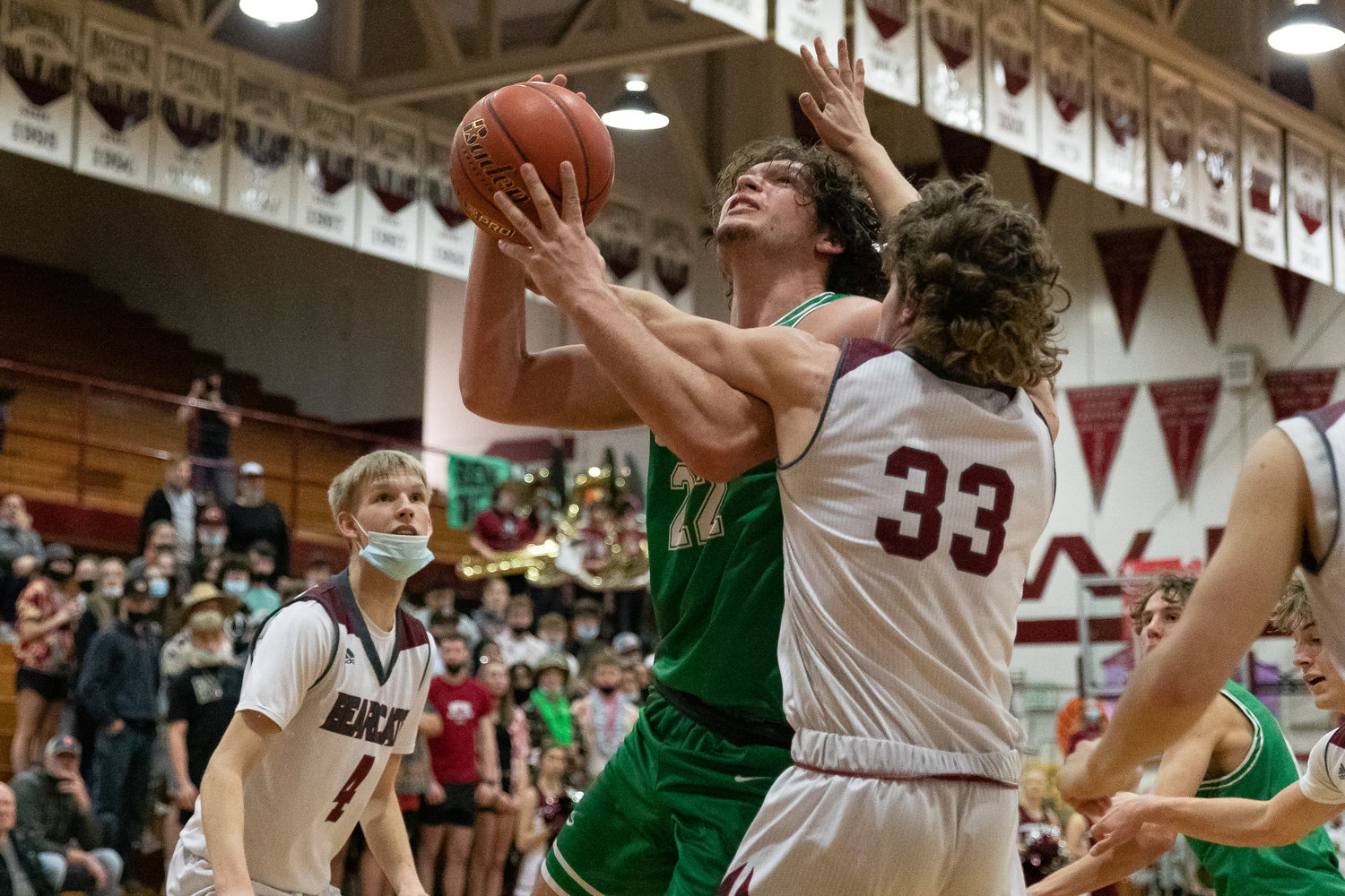 Tumwater forward Ryan Otton is fouled on a layup attempt against W.F. West Jan. 25.