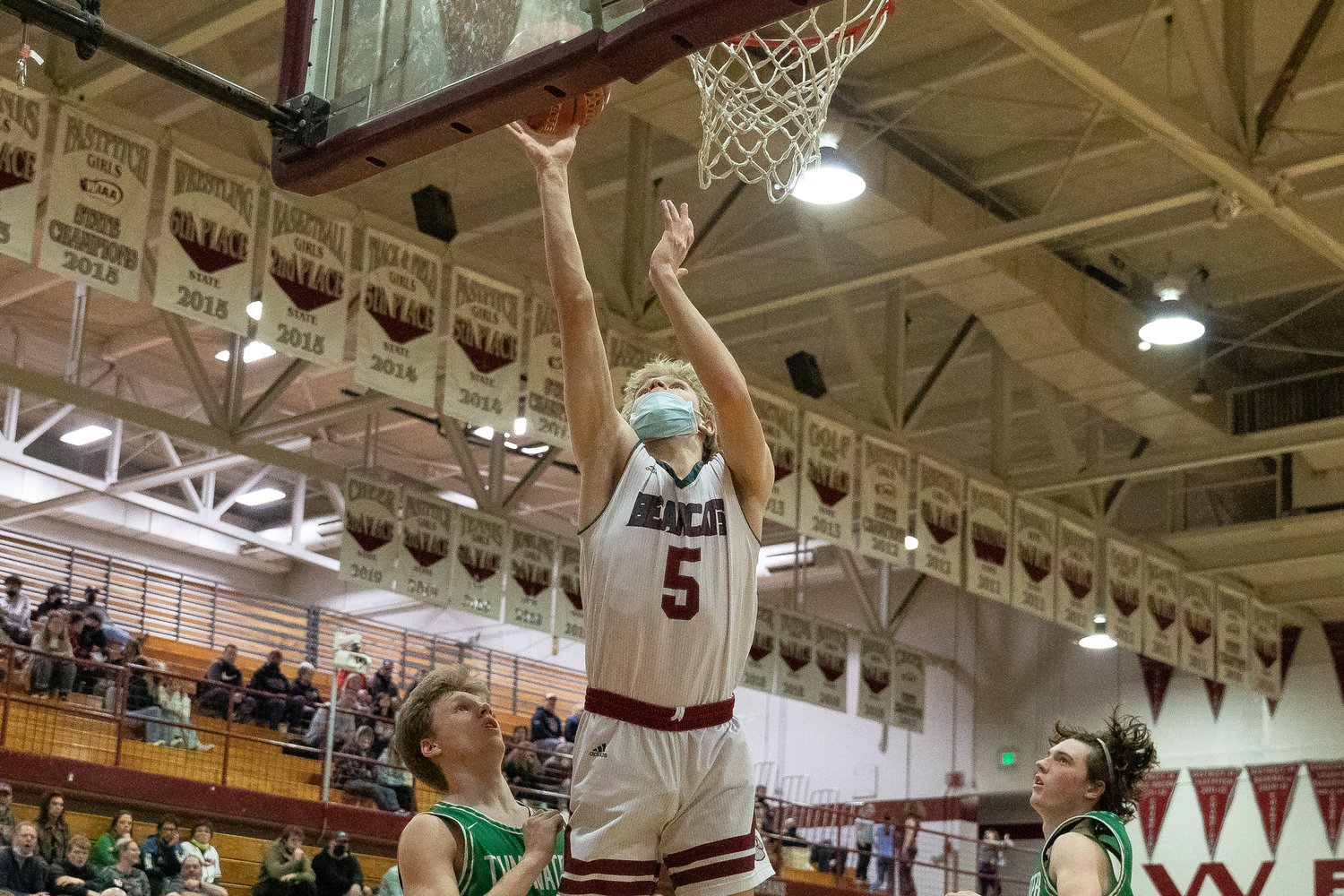Bearcats guard Dirk Plakinger rises for a layup against Tumwater Jan. 25.