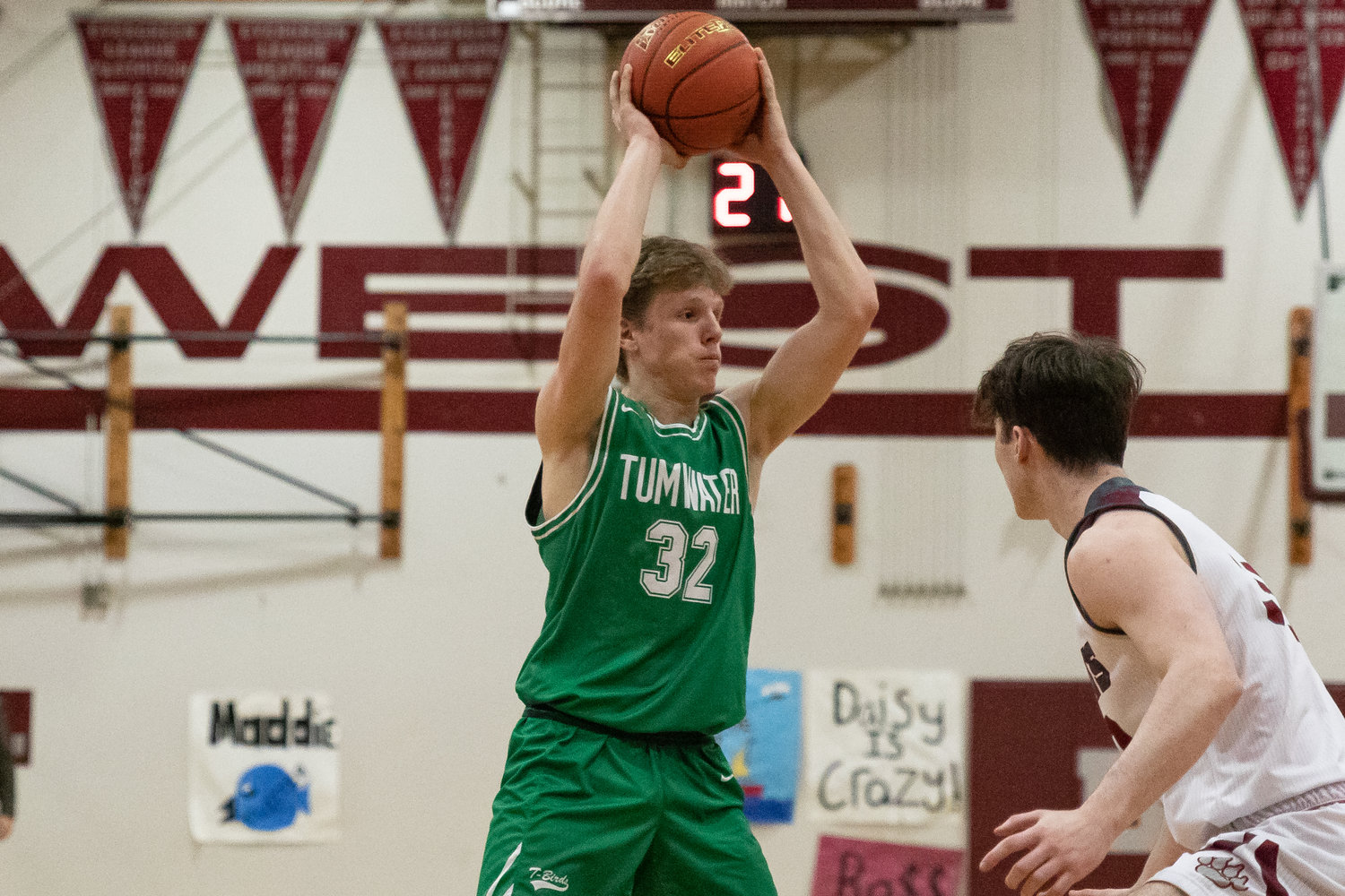 Tumwater post Adam Overbay looks to pass against W.F. West Jan. 25.