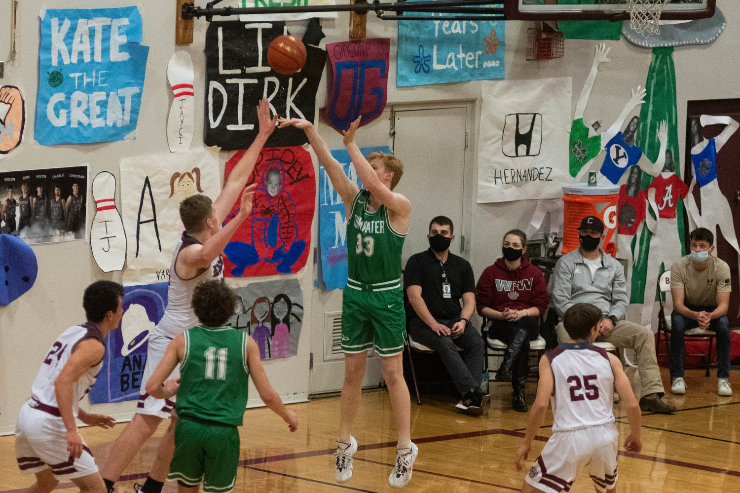 Tumwater Guard Jake Dillon goes up for jumpshot over W.F. West Post Soren Dalan Jan. 25