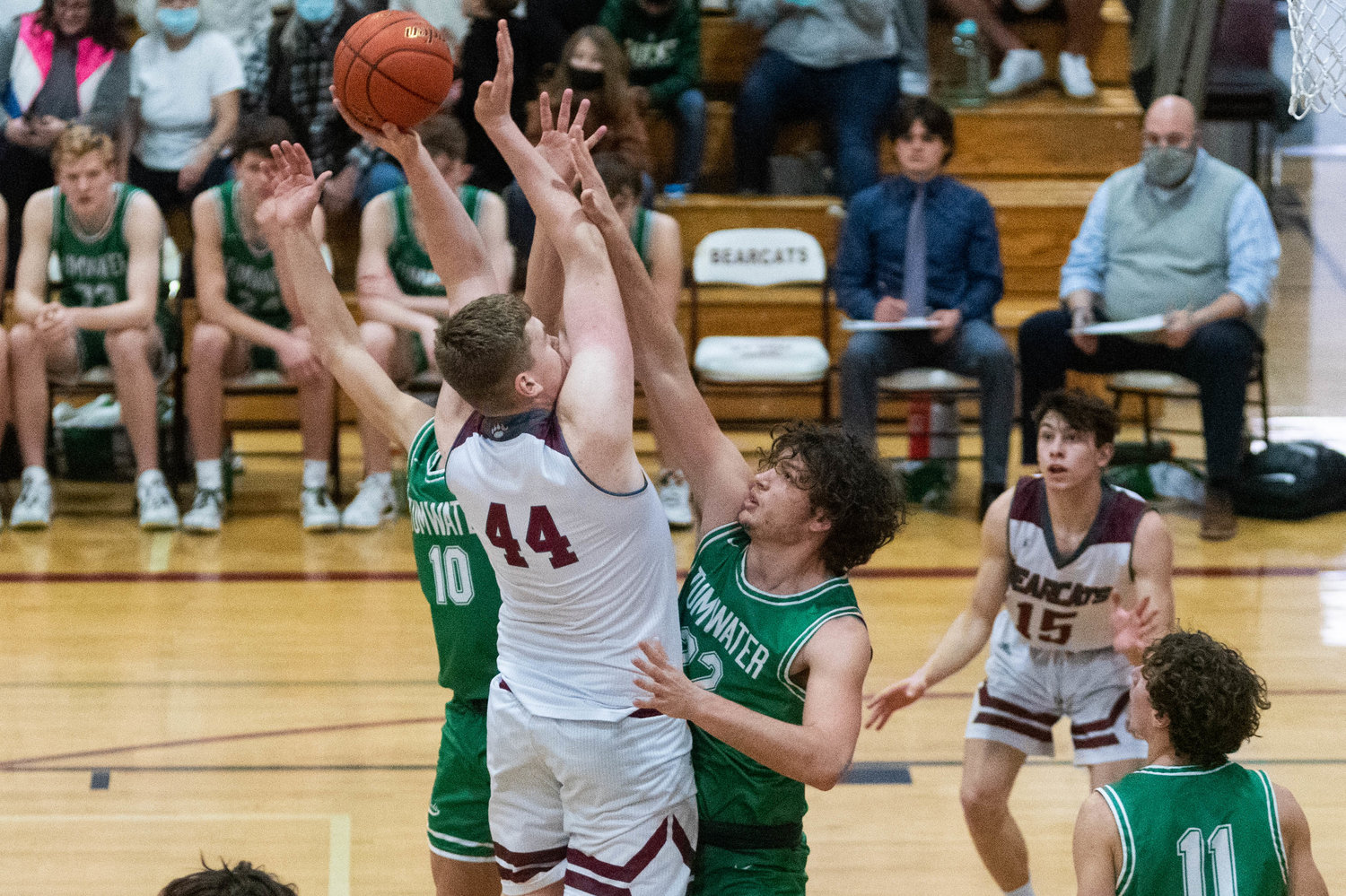 W.F. West Junior Soren Dalan goes up for shot over Tumwater Forward Ryan Otton and guard Andrew Collins Jan. 25