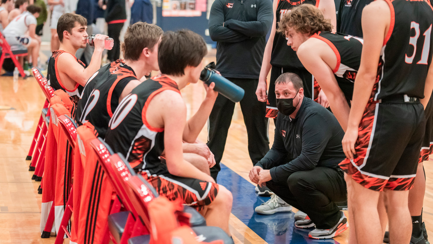 Centralia Head Coach Kyle Donahue talks to athletes during a game at Black Hills Tuesday night.