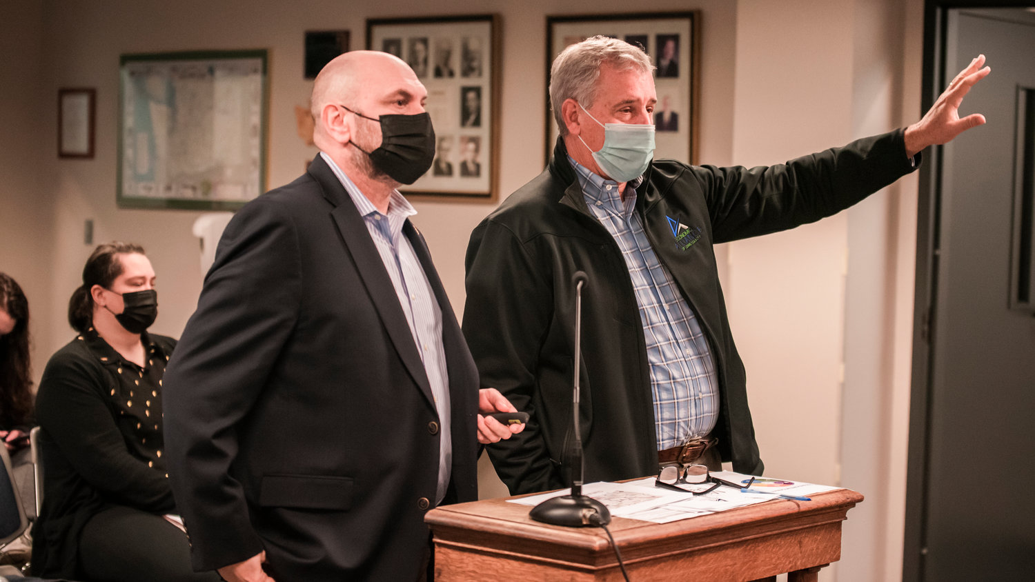 Lewis County Economic Development Council Executive Director Richard DeBolt, right, and Infrastructure Initiatives Program Manager Todd Chaput talks to the Chehalis City Council Monday evening.