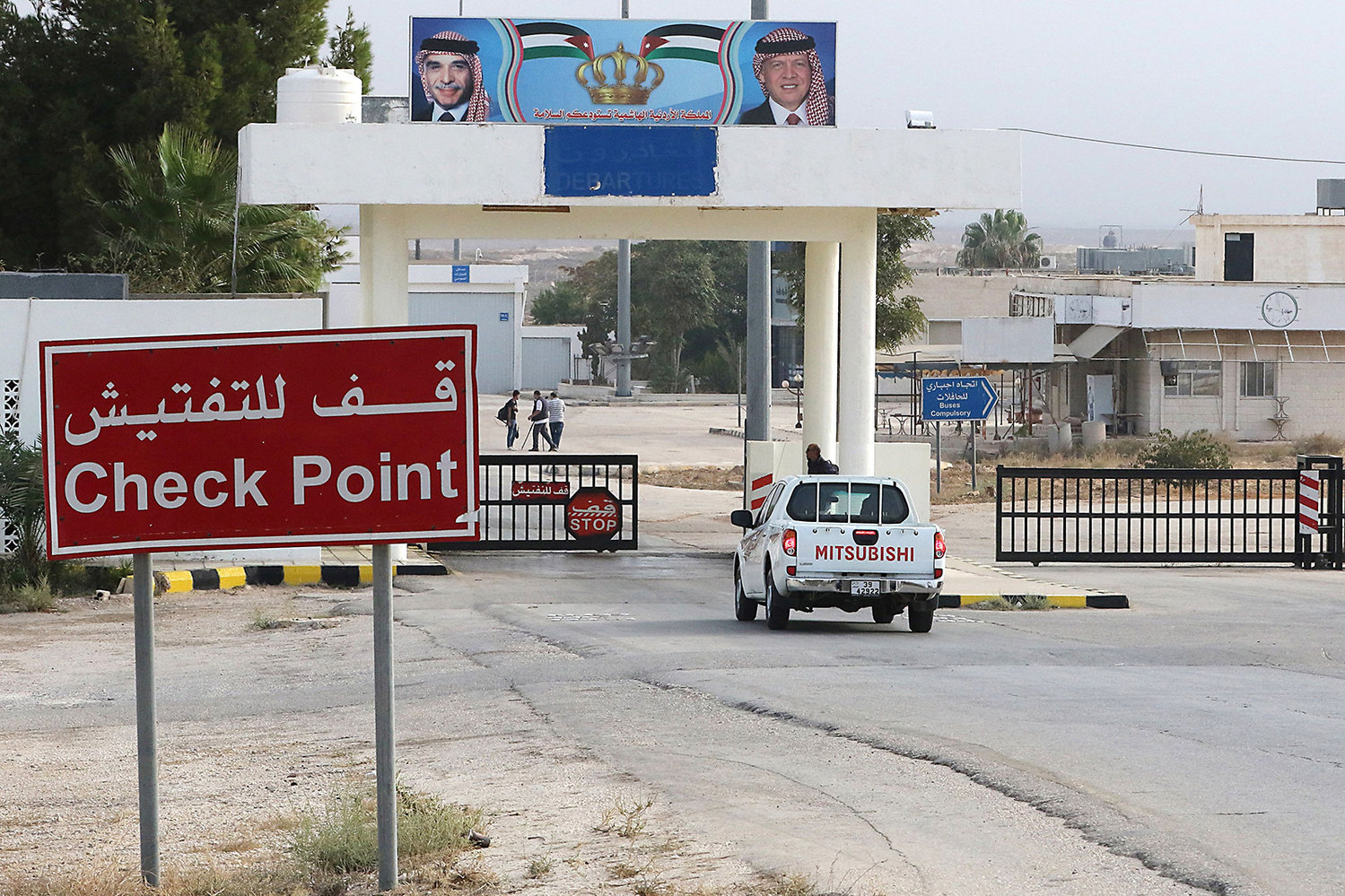 A vehicle arrives at the Jaber border crossing between Jordan and Syria (Nassib crossing on the Syrian side) on the day of its reopening on Oct. 15, 2018, in the Jordanian Mafraq governorate. (Khalil Mazraawi/AFP via Getty Images/TNS)
