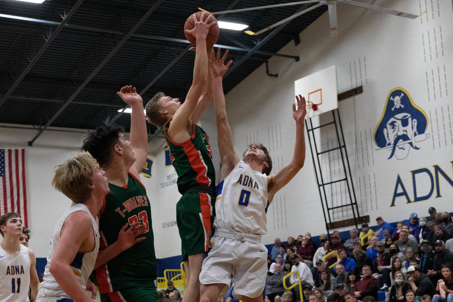 MWP forward Gary Dotson skies for a rebound against Adna's Aaron Aselton Jan. 28.