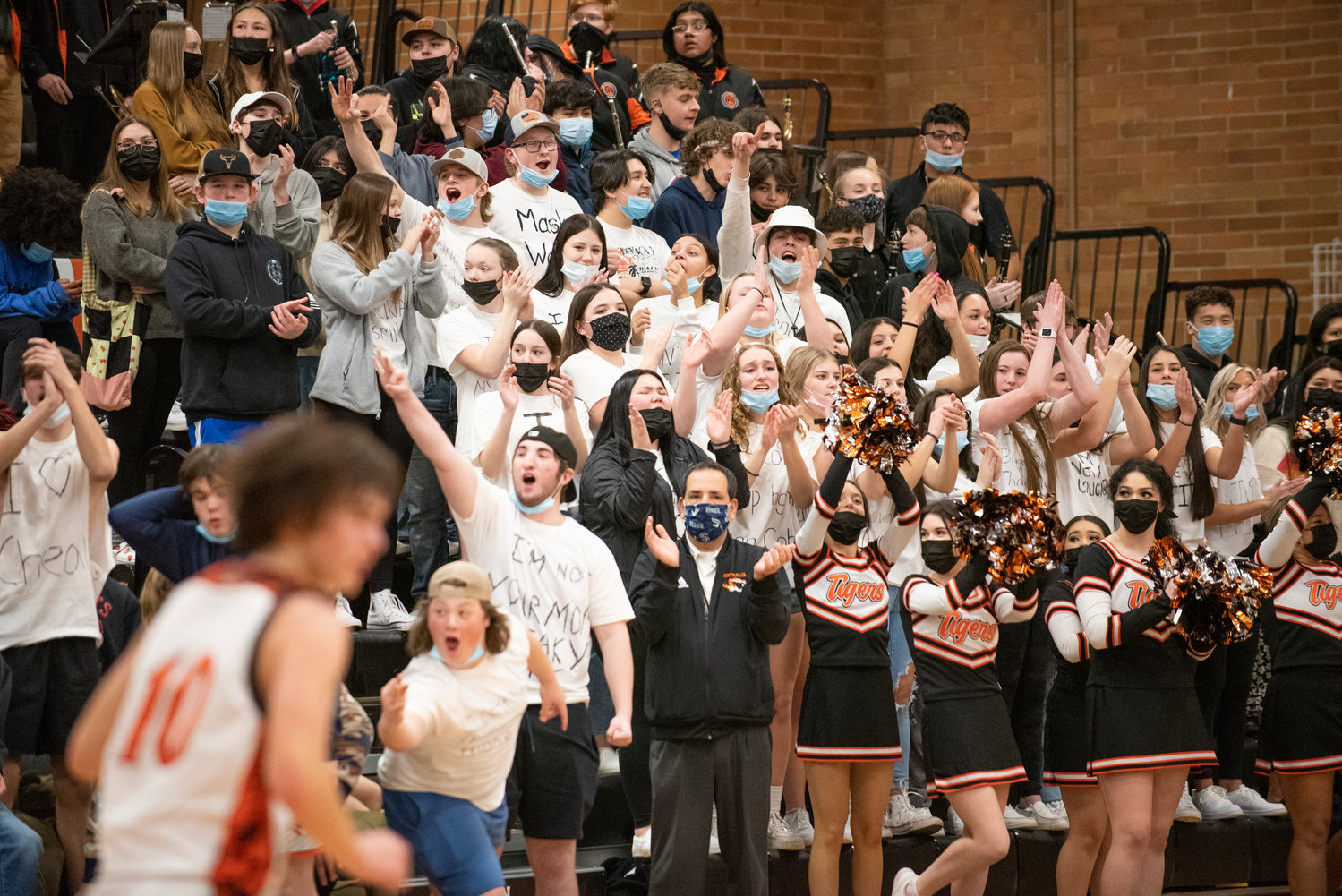Centralia's student section cheers after a Tigers' bucket against W.F. West during the Swamp Cup on Wednesday.