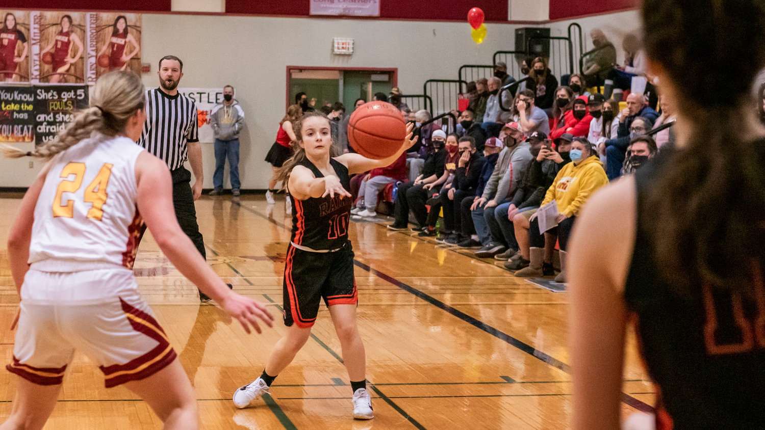 Rainier Senior Selena Niemi (10) makes a pass Wednesday night during a game against the Cardinals at Winlock High School.
