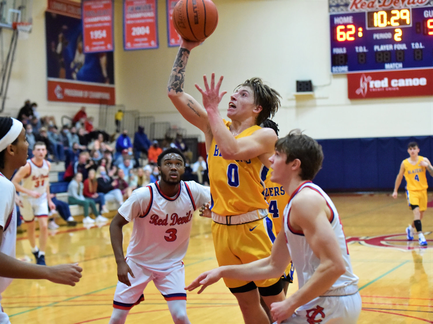 Centralia College's Colby White (0) drives to the bucket against Lower Columbia on Feb. 2.