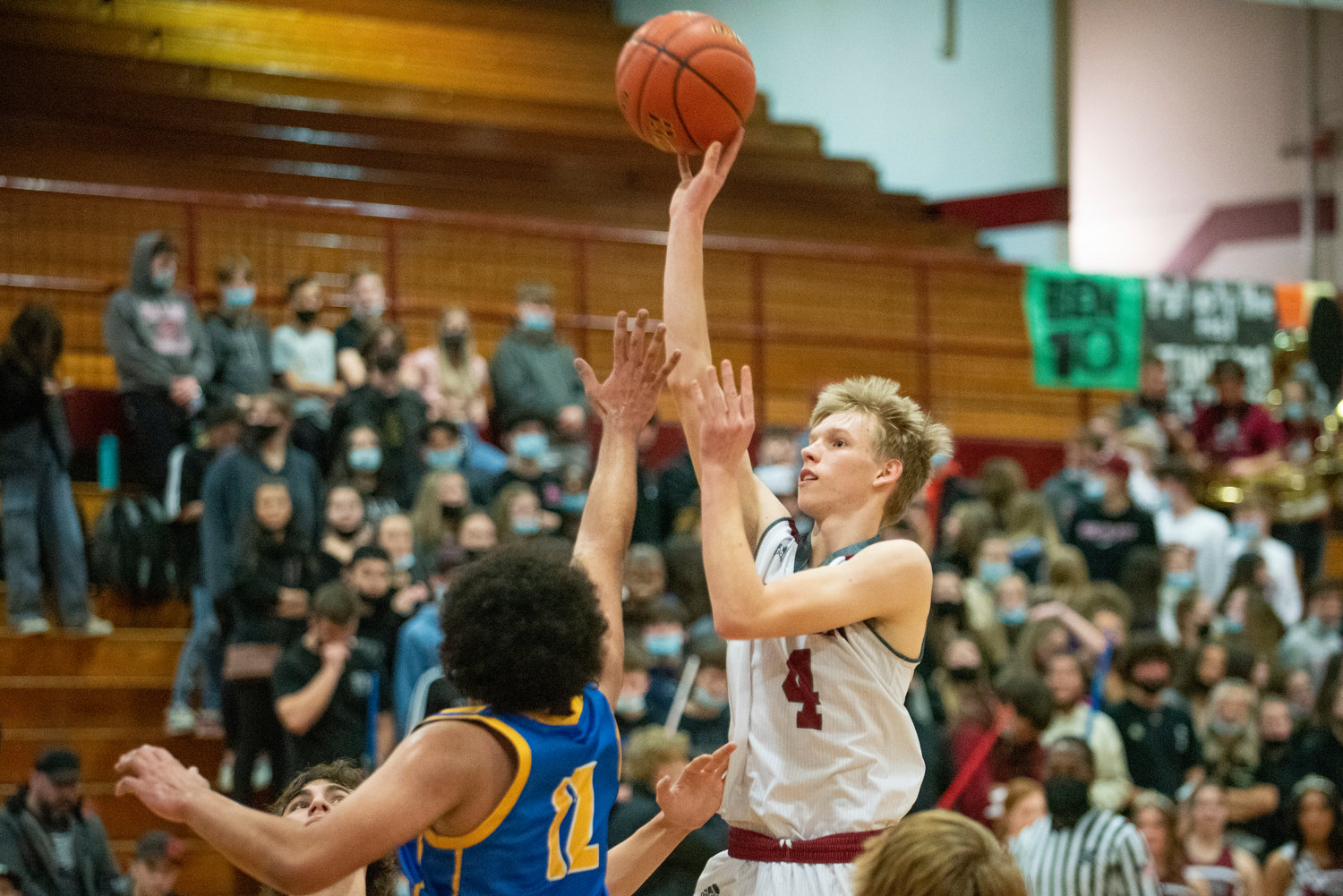 W.F. West's Evan Tornow (4) shoots a midrange jumper against Rochester on Feb. 4.