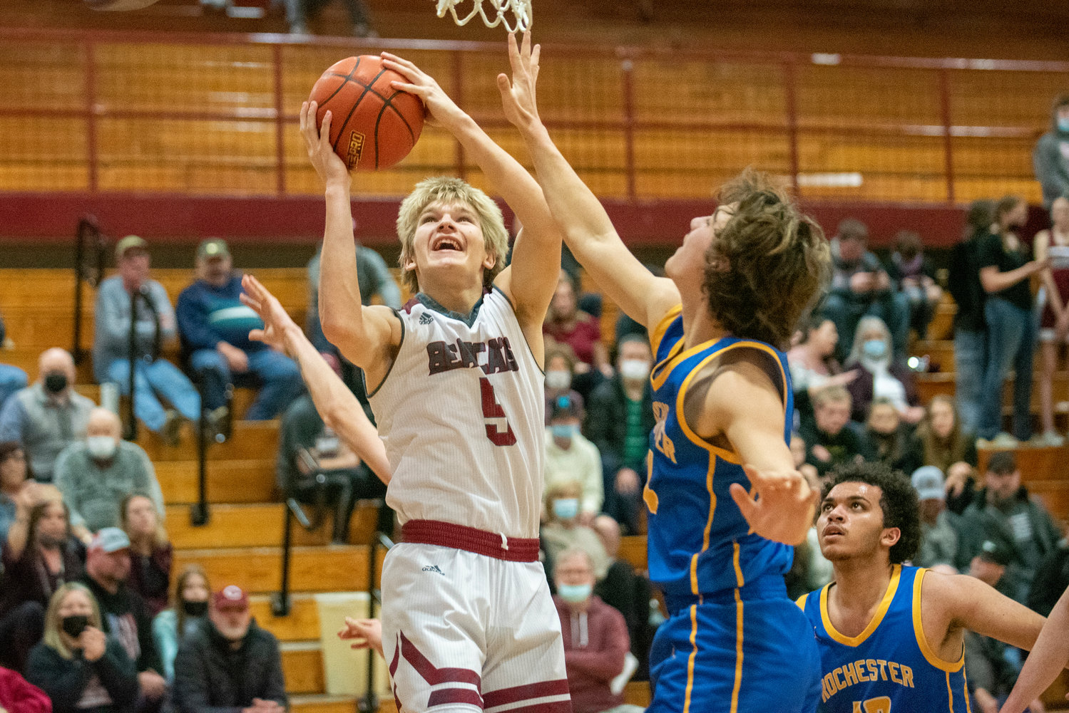 W.F. West senior Dirk Plakinger (5) leaps for a layup against Rochester on Feb. 4.