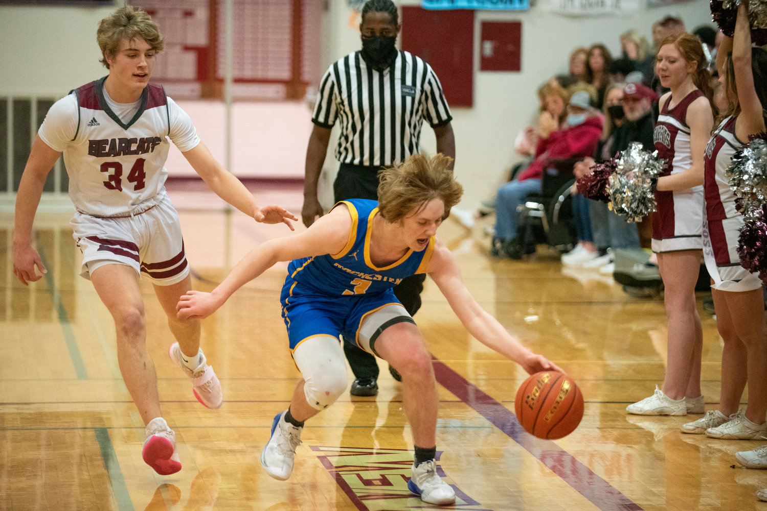 Rochester's Ben Clouse (3) hauls in a loose ball during a road game at W.F. West on Feb. 3.