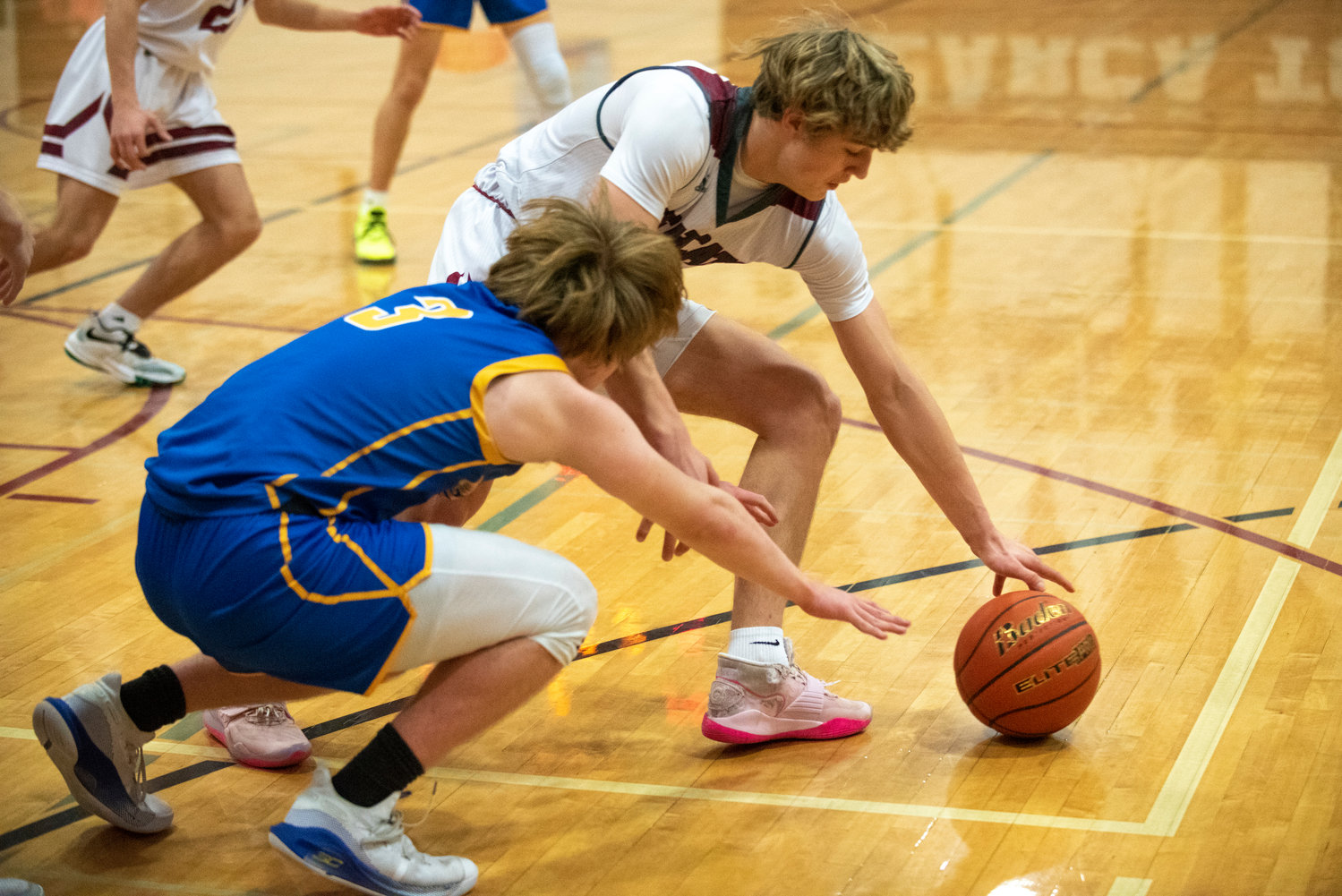 W.F. West freshman Gage Brumfield steals the ball from Rochester's Ben Clouse (3) on Feb. 4.