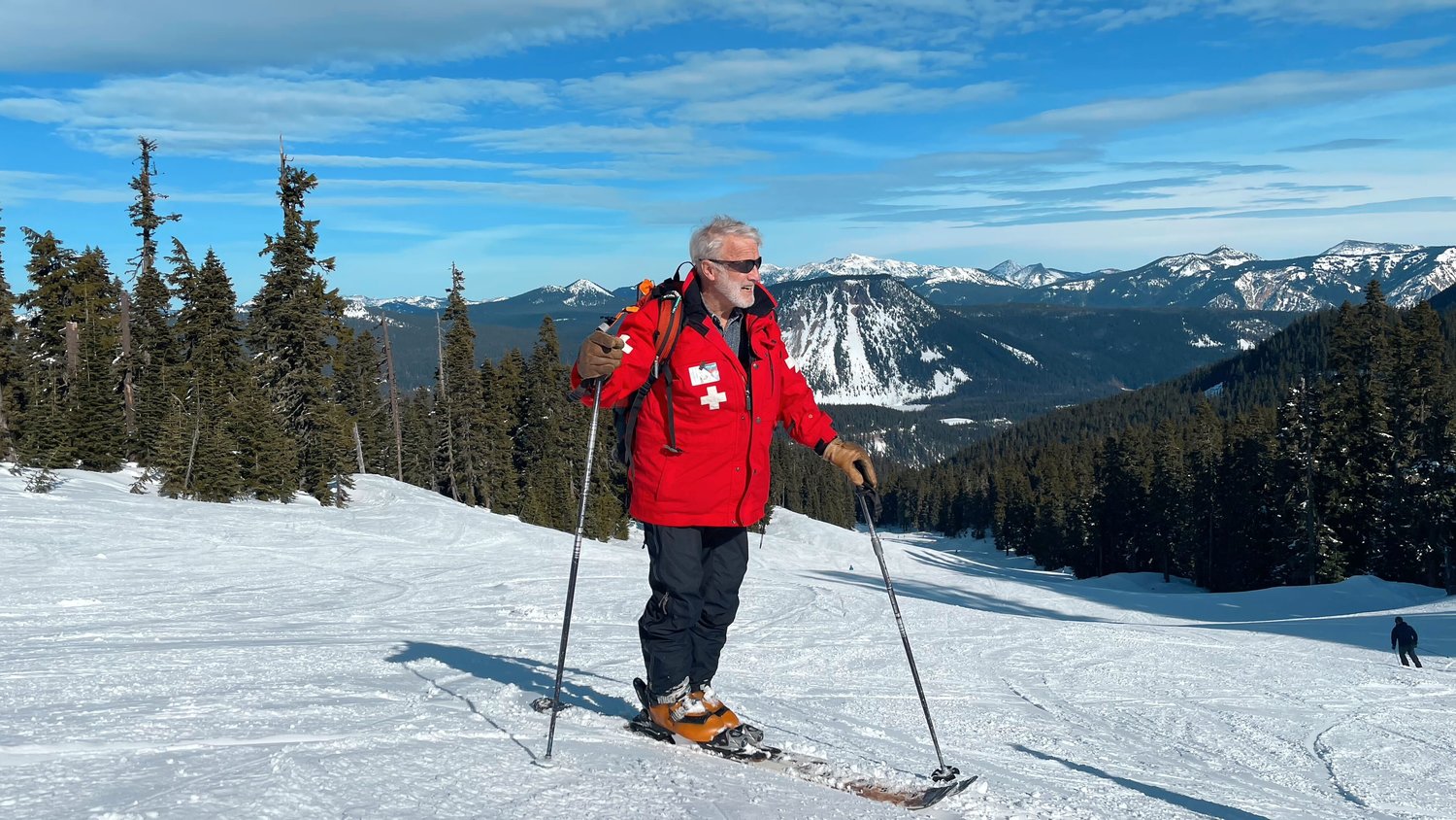 Michael Murphy, known on the slopes as “Murph,” patrols the front half of the mountain on skis checking on riders before continuing down the Cascade route Sunday at the White Pass Ski Resort.
