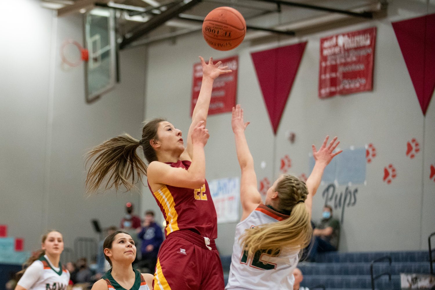 Pe Ell's Charlie Carper (22) skies for a floater for Winlock in a playoff game against Morton-White Pass on Feb. 8.