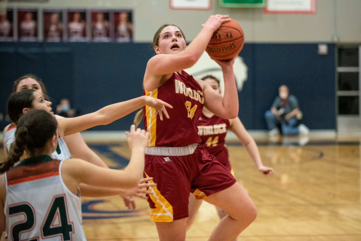 Winlock senior Addison Hall (24) drives for a shot against Morton-White Pass in the district playoffs on Feb. 8 at Black Hills High School.