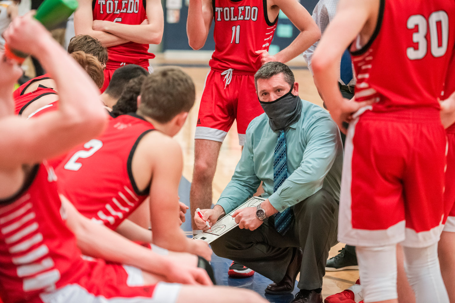 Toledo Head Coach Grady Fallon talks to players during a game Wednesday night.