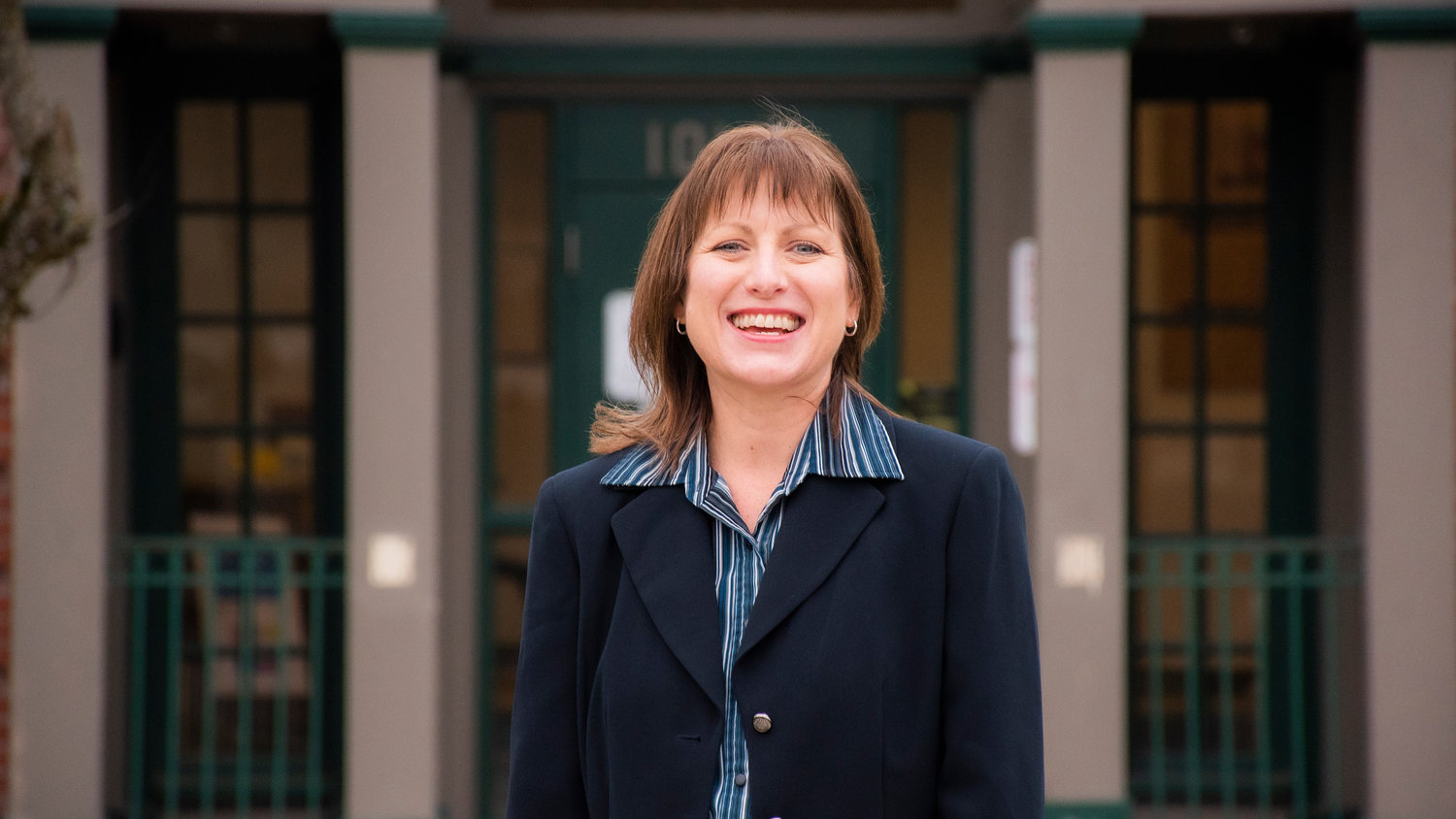 Outgoing Rochester Superintendent Kim Fry smiles outside the district office Thursday afternoon.