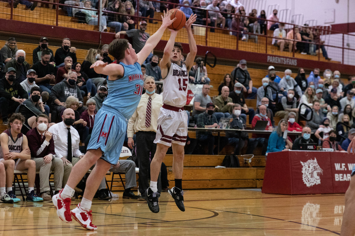W.F. West guard Seth Hoff lines up a 3-pointer in a loss to Mark Morris in the opening round of the 2A District IV playoffs in Chehalis Feb. 12.