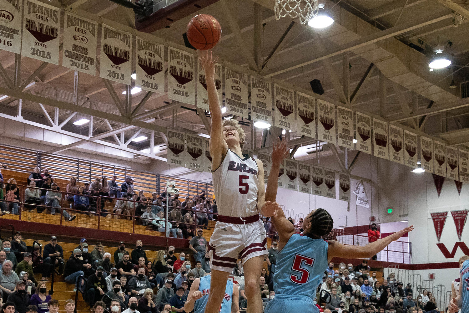W.F. West guard Dirk Plakinger rises up for a layup attempt in a loss to Mark Morris in the opening round of the 2A District IV playoffs in Chehalis Feb. 12.