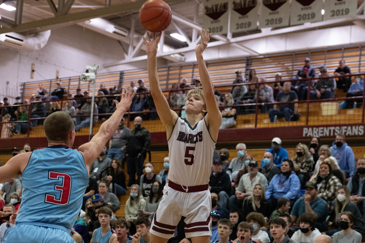 Bearcat guard Dirk Plakinger attempts a 3-pointer in a loss to Mark Morris in the opening round of the 2A District IV playoffs in Chehalis Feb. 12.