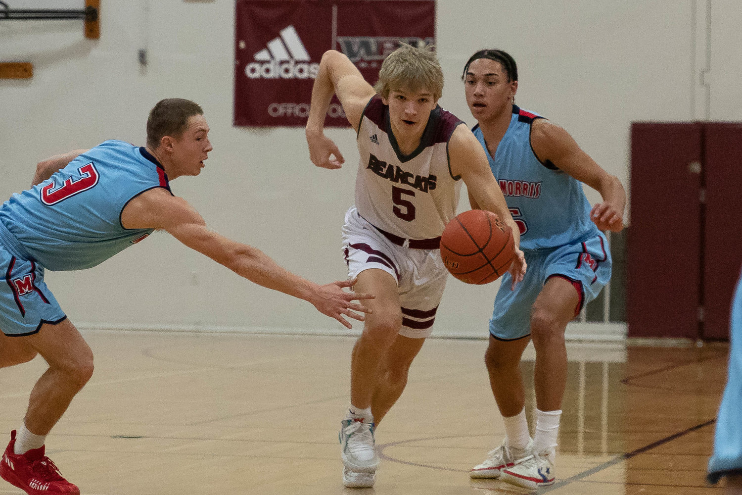 Bearcat guard Dirk Plakinger drives past the defense in a loss to Mark Morris in the opening round of the 2A District IV playoffs in Chehalis Feb. 12.