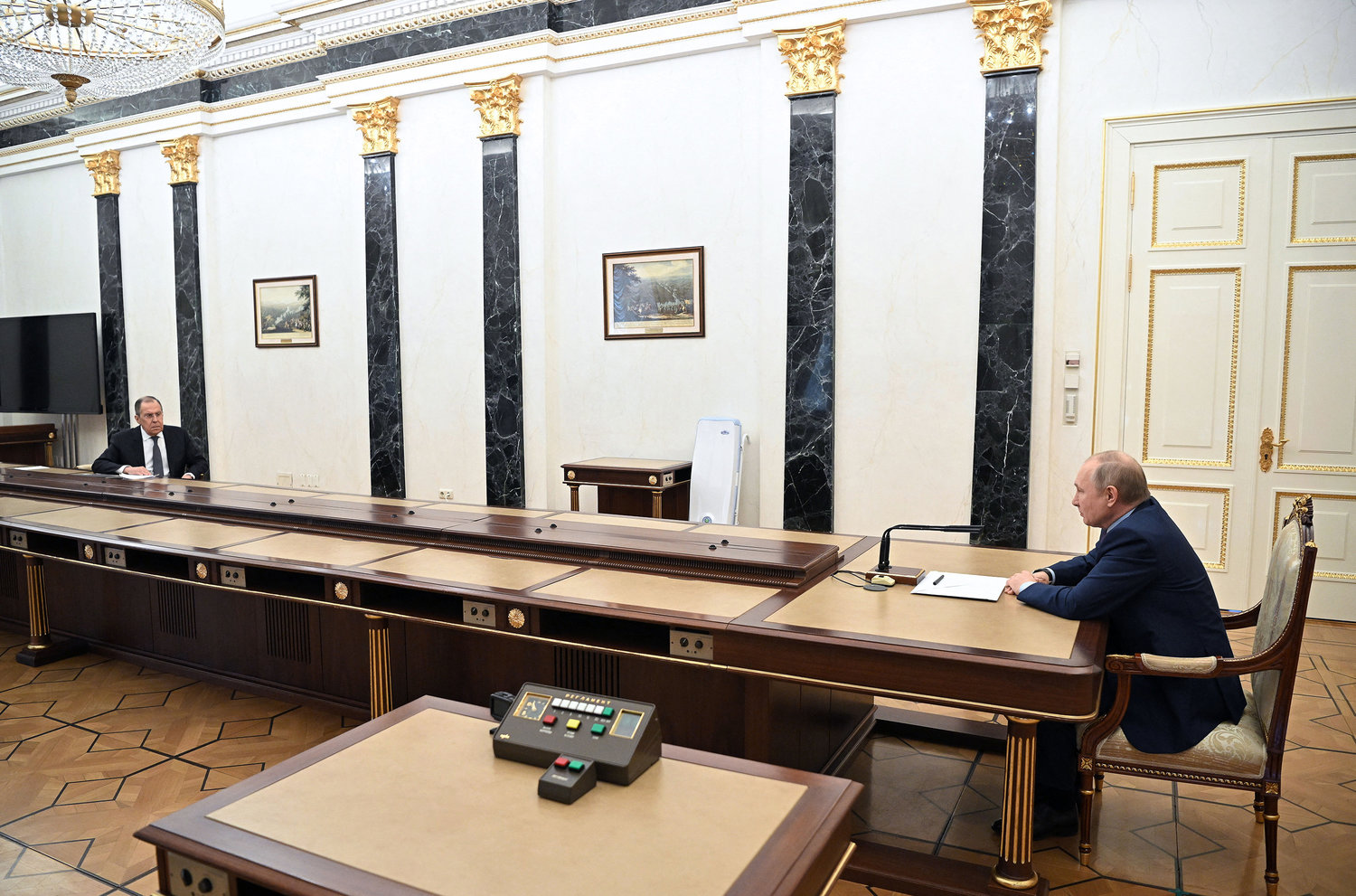 Russian President Vladimir Putin (right) and Foreign Minister Sergei Lavrov hold a meeting at the Kremlin, in Moscow on Monday, Feb. 14, 2022. (Alexei Nikolsky/Sputnik/AFP/Getty Images/TNS)