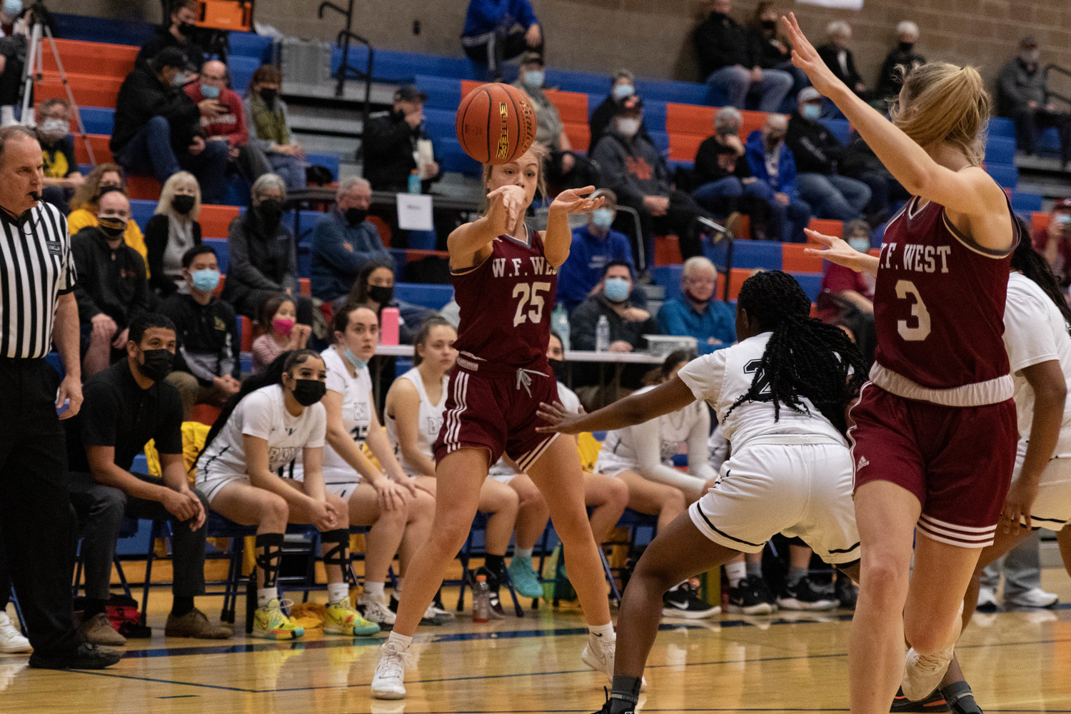 W.F. West guard Kyla McCallum launches a pass toward Lexi Roberts against Hudson's Bay in the 2A District IV semifinals at Ridgefield Feb. 14.